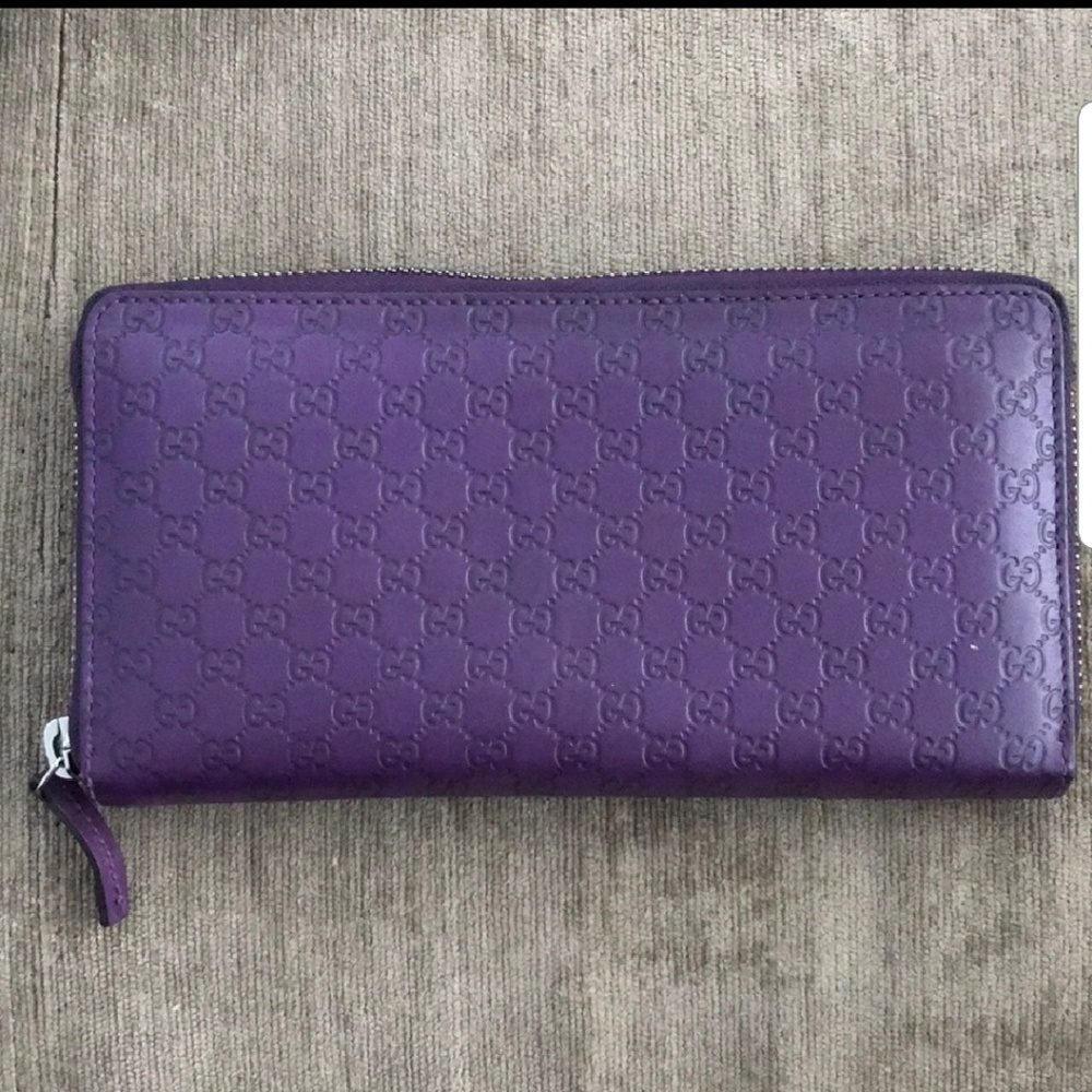 Authentic Gucci Monogram zipper wallet